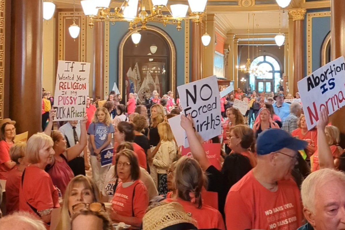 Volunteers are showing up, knocking doors to protect reproductive rights