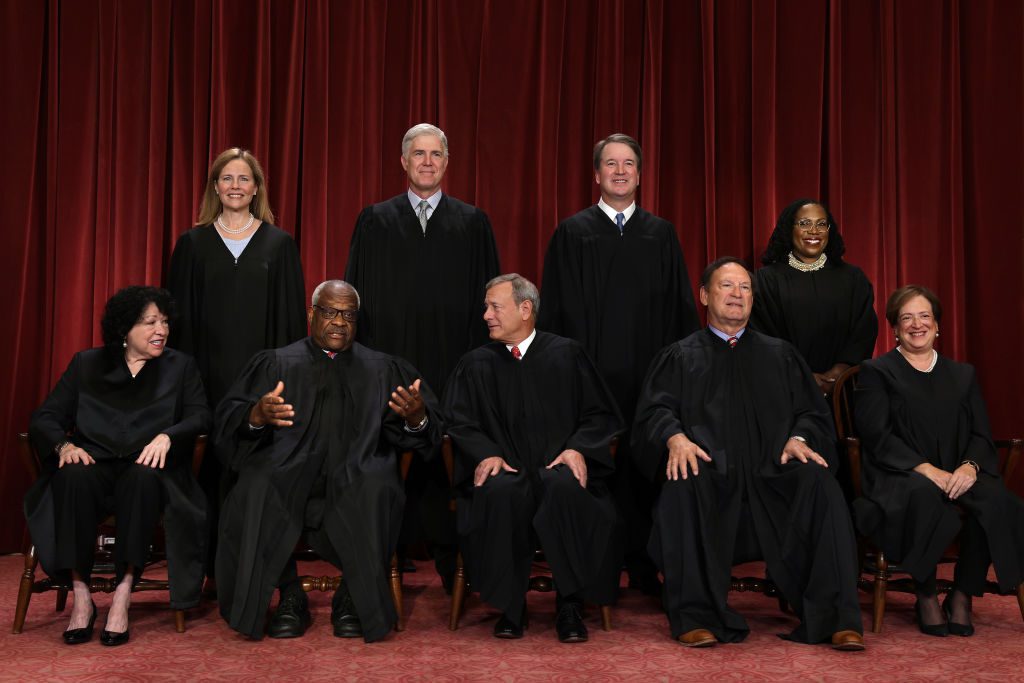 United States Supreme Court (front row L-R) Associate Justice Sonia Sotomayor, Associate Justice Clarence Thomas, Chief Justice of the United States John Roberts, Associate Justice Samuel Alito, and Associate Justice Elena Kagan, (back row L-R) Associate Justice Amy Coney Barrett, Associate Justice Neil Gorsuch, Associate Justice Brett Kavanaugh and Associate Justice Ketanji Brown Jackson pose for their official portrait at the East Conference Room of the Supreme Court building on October 7, 2022 in Washington, DC. The Supreme Court has begun a new term after Associate Justice Ketanji Brown Jackson was officially added to the bench in September. (Photo by Alex Wong/Getty Images)