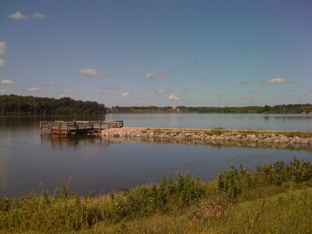 Lake Sugema with a blue sky behind it.