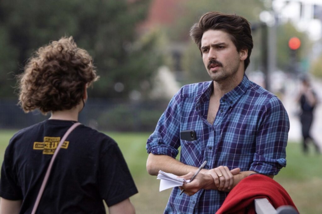 Zachary Oren Smith interviews a union member in Iowa City.